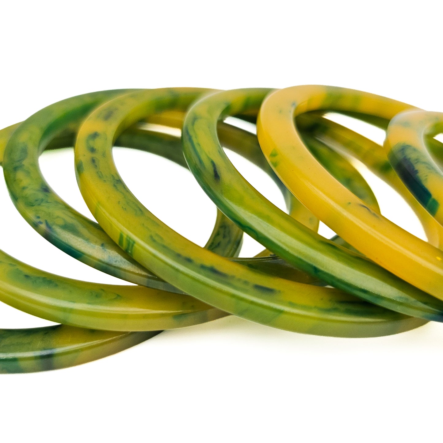 Set of 7 Marbled Spinach Green Tested Bakelite Spacer Bangles