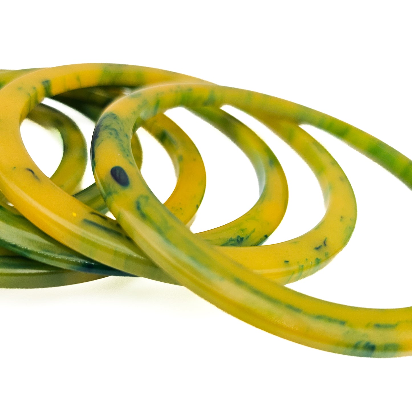 Set of 7 Marbled Spinach Green Tested Bakelite Spacer Bangles